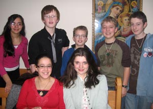Andrew, Matthew, Jess, Pete and Jonathan with two young people from the Sunday School 